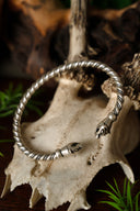 Bracelet viking avec têtes de belette, bronze argenté