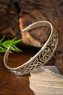 Narrow Celtic bracelet with trisquelion, silvered bronze