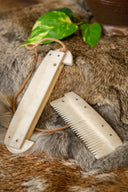 Pettine vichingo in osso con motivi stilizzati