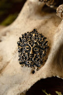 The Green Man amulet, brass