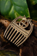 Bronze Age comb with sunwheel, bronze