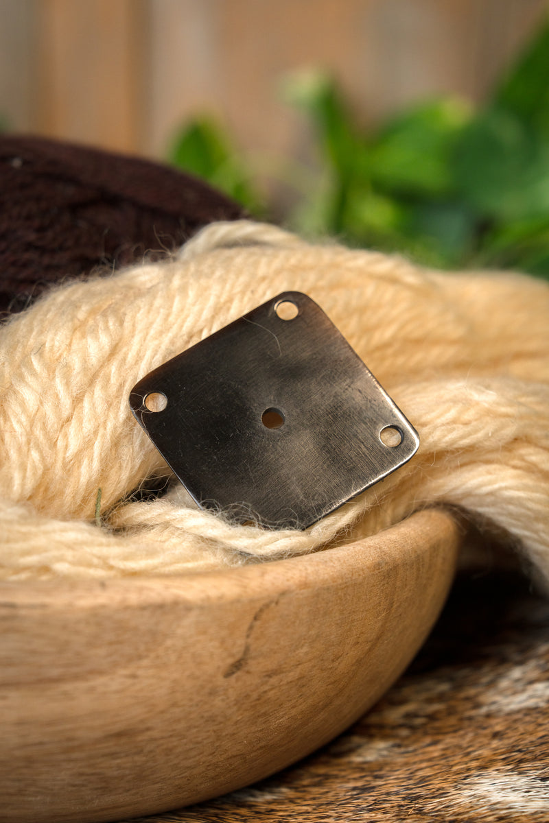 Tessera di tessitura in corno 