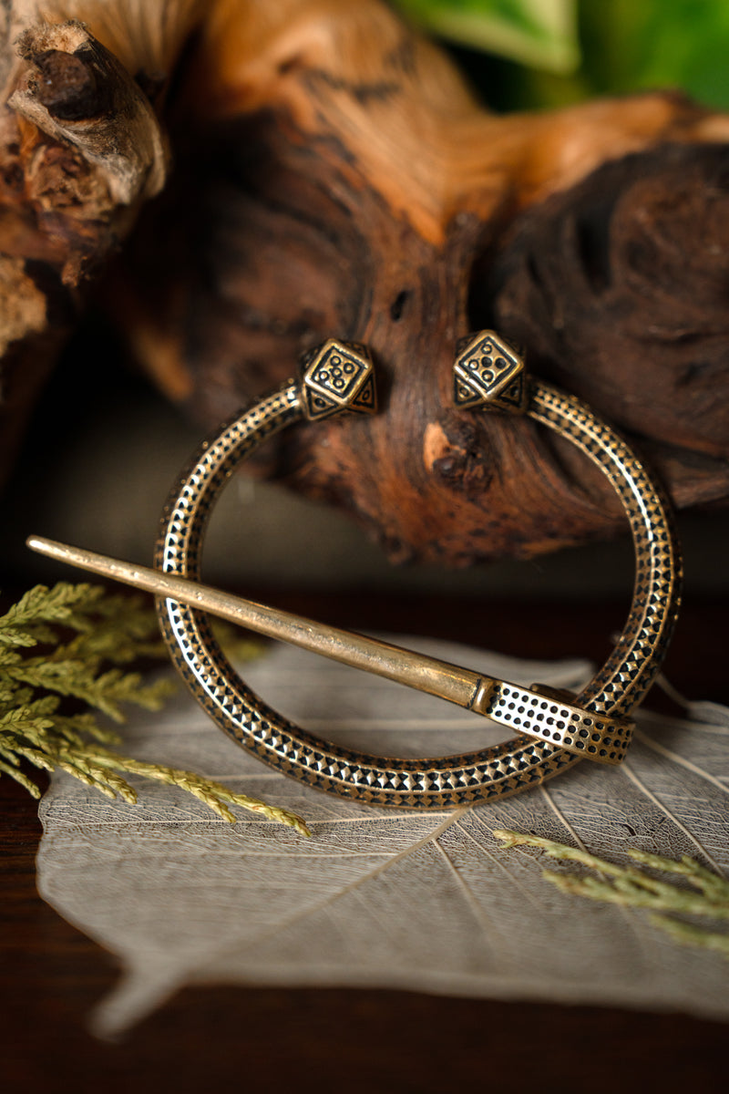 Viking hoefijzerfibula Finland, brons