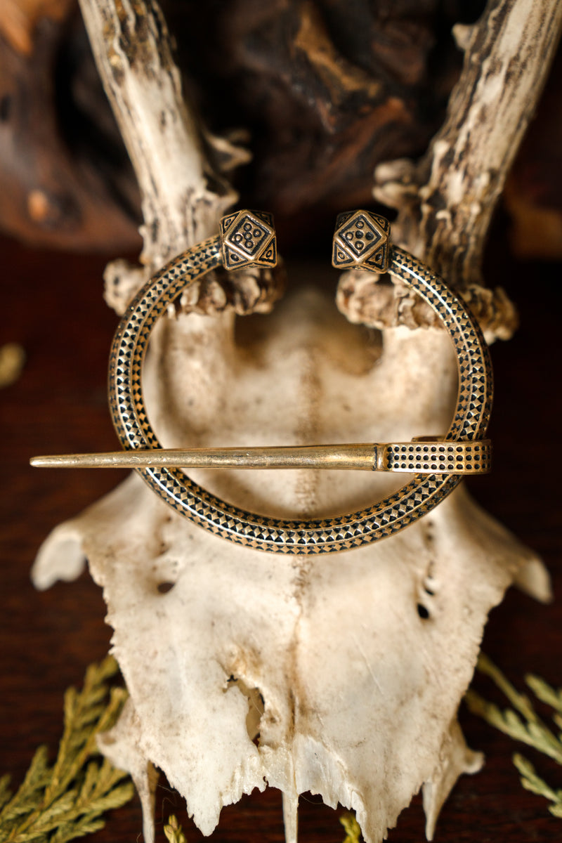 Viking hoefijzerfibula Finland, brons