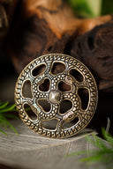 Merovingische zierscheibe zonnekruis, brons