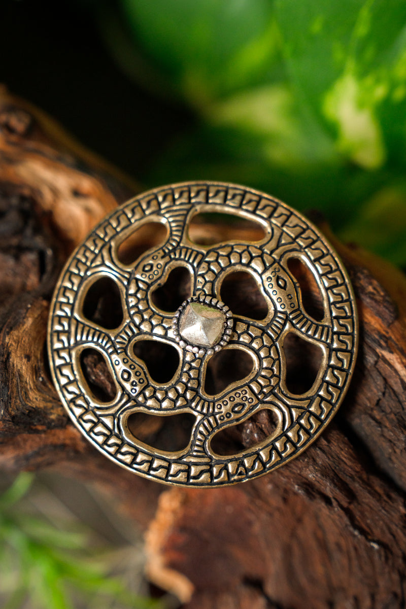 Merovingische zierscheibe zonnekruis, brons