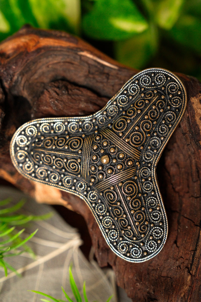 Kleeblad fibula Stora Ryk, brons