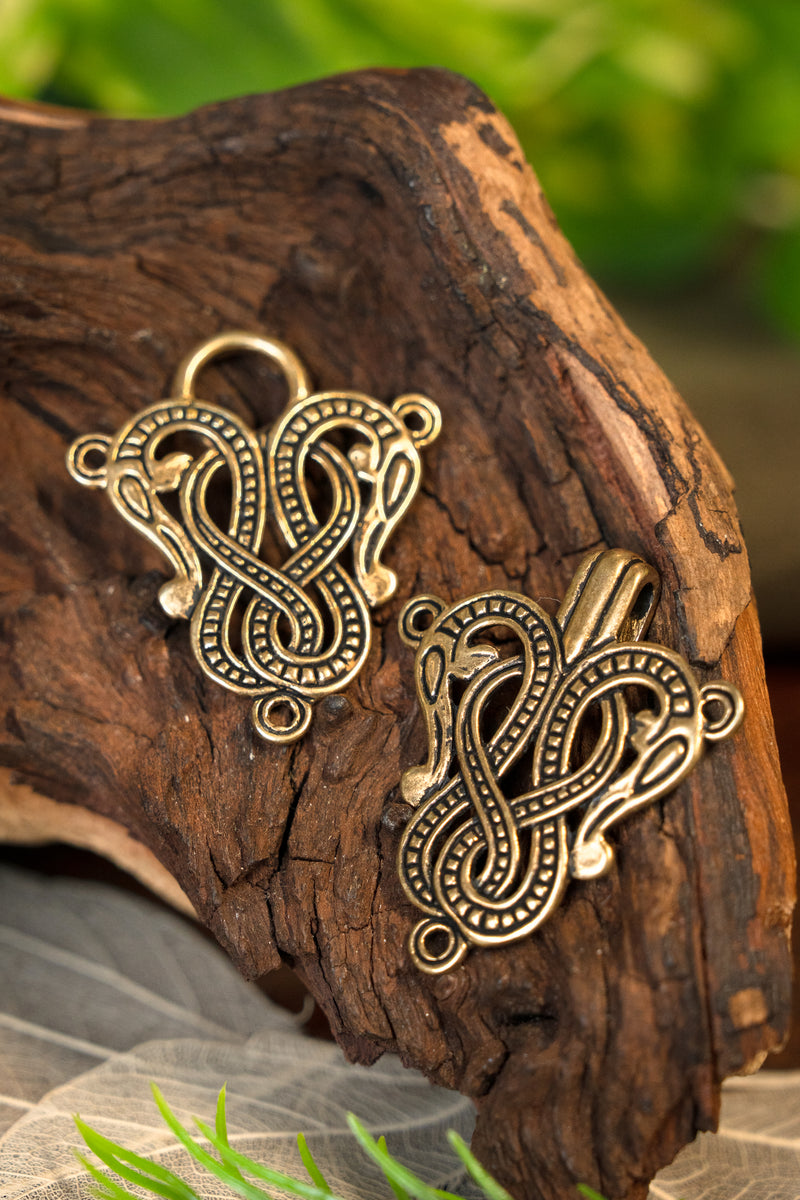 Cloak clasp Midgard snake Urnes style, bronze