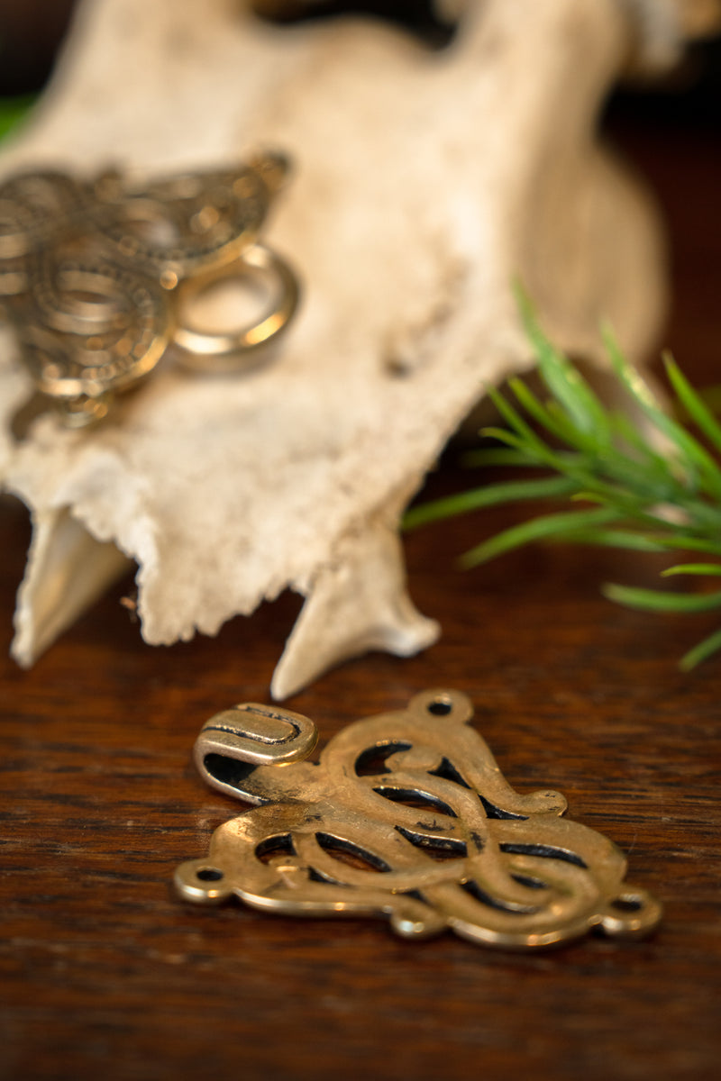 Cloak clasp Midgard snake Urnes style, bronze