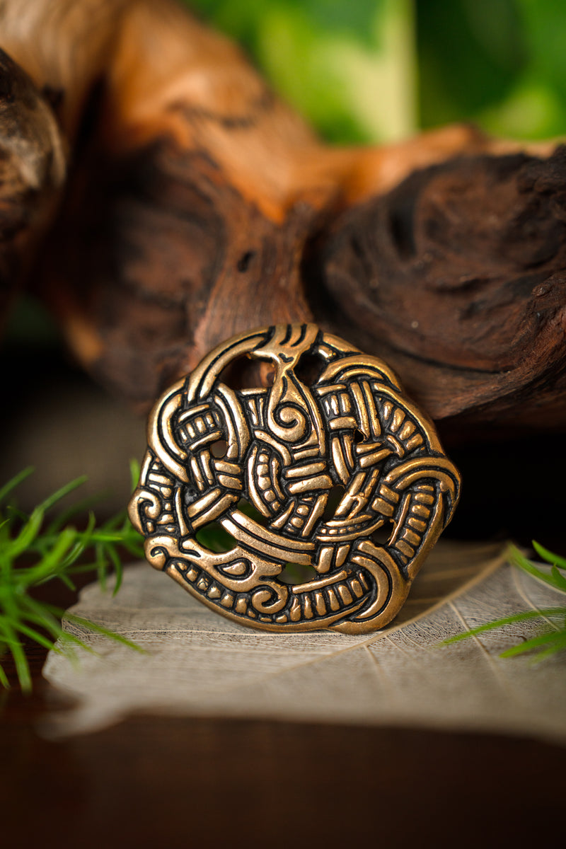 Urnesstijl schijffibula, brons