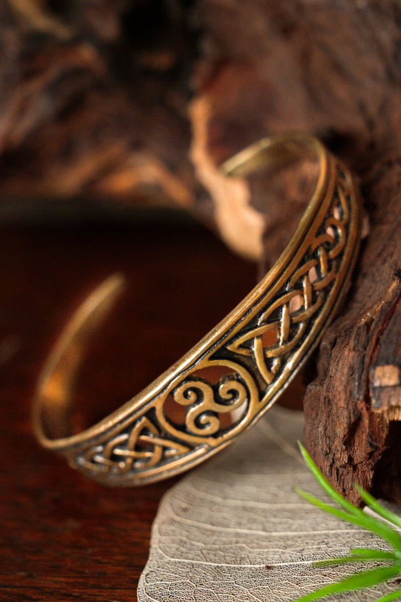 Narrow Celtic bracelet with trisquelion, bronze