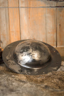 Hand beaten shield boss for round shield