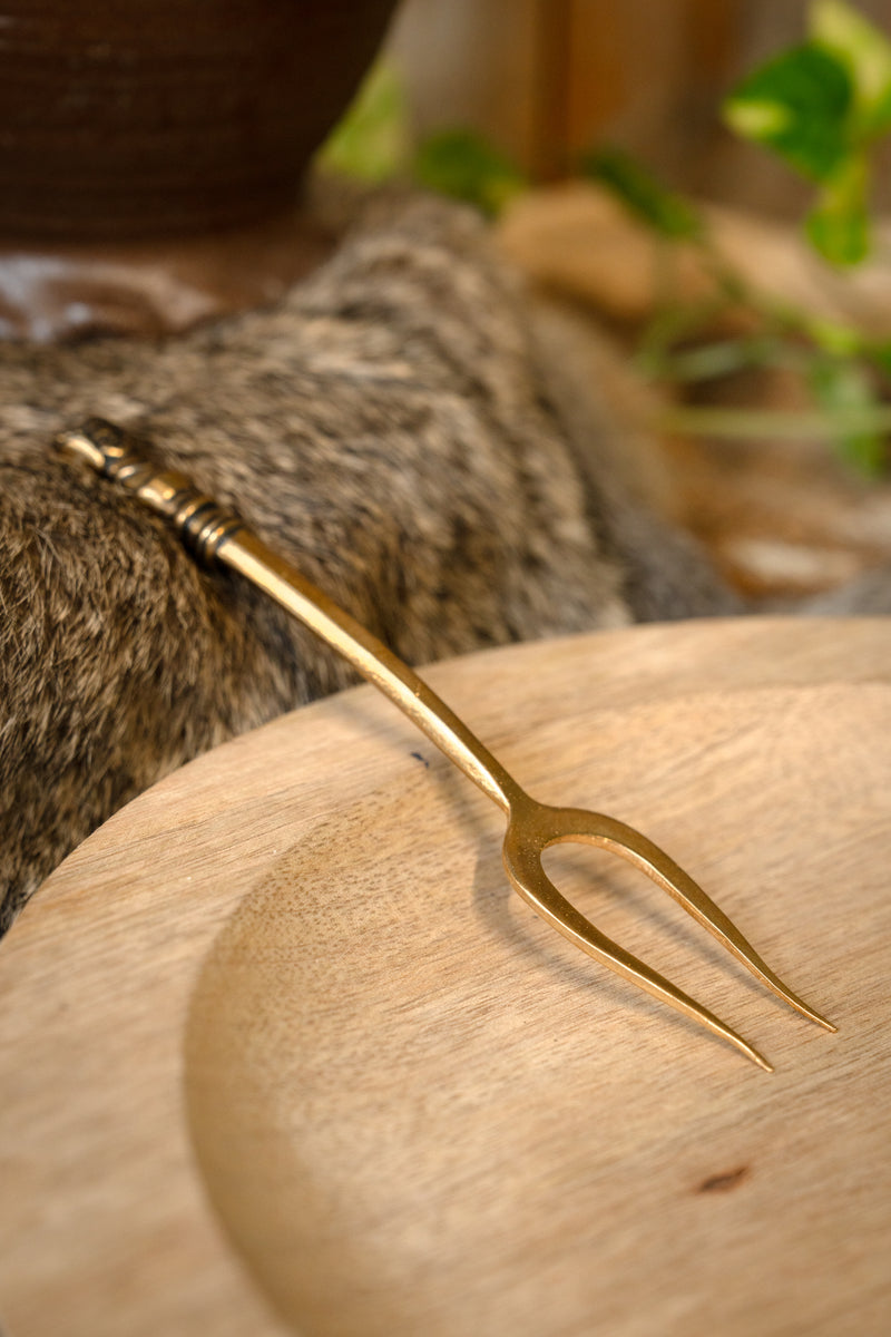 Middeleeuwse vork met meisjeshoofd