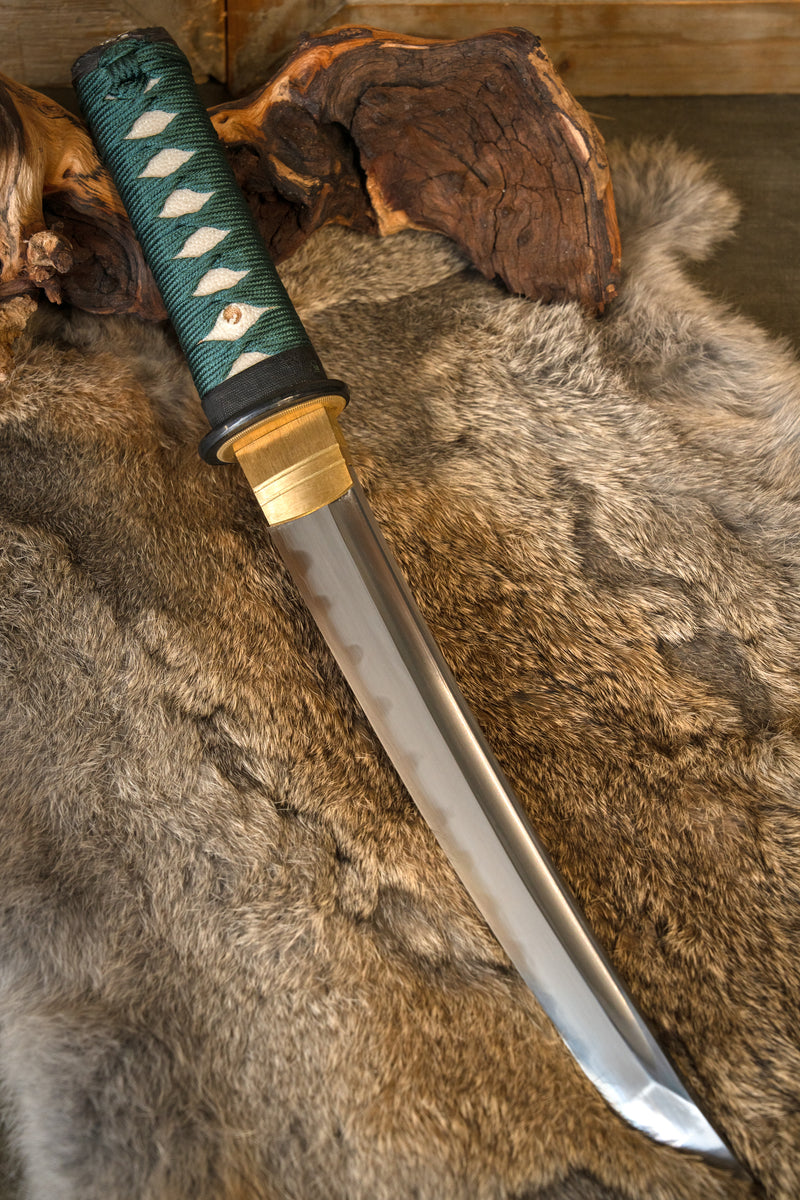 John Lee Tio Kejs Tanto, vass 