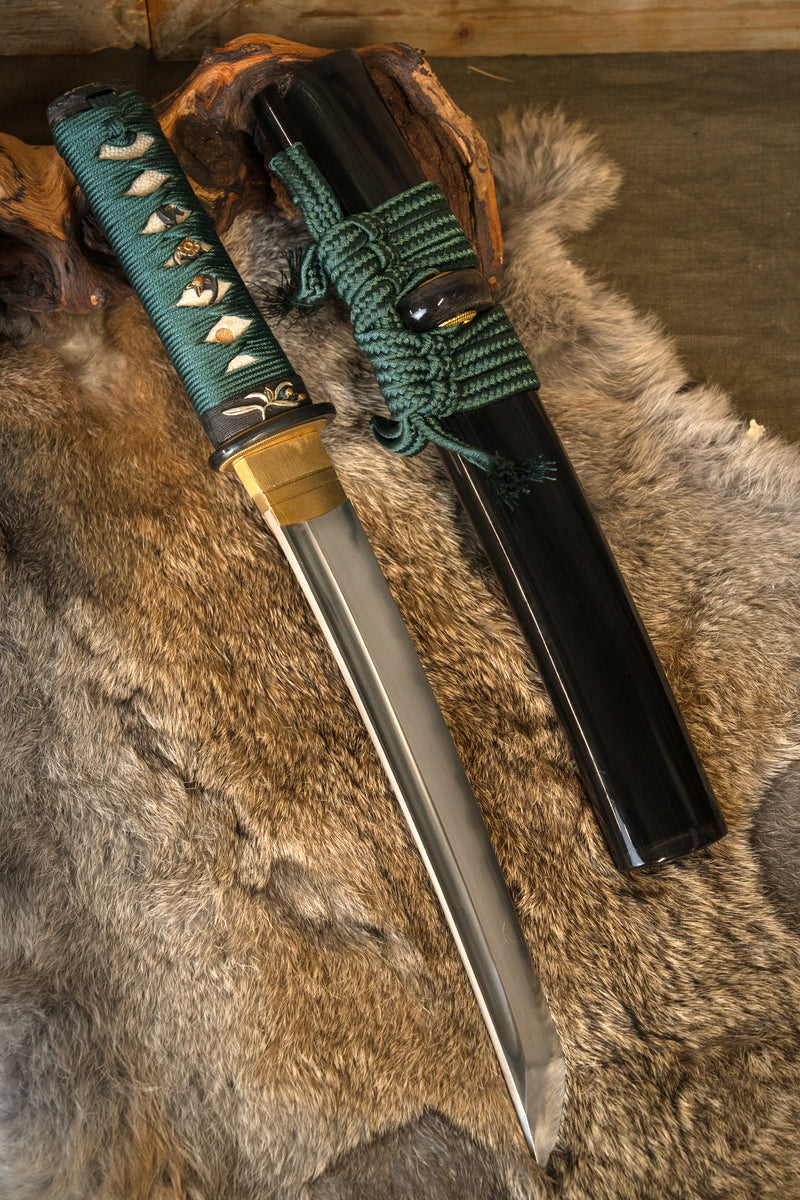 John Lee Tio Kejs Tanto, vass 