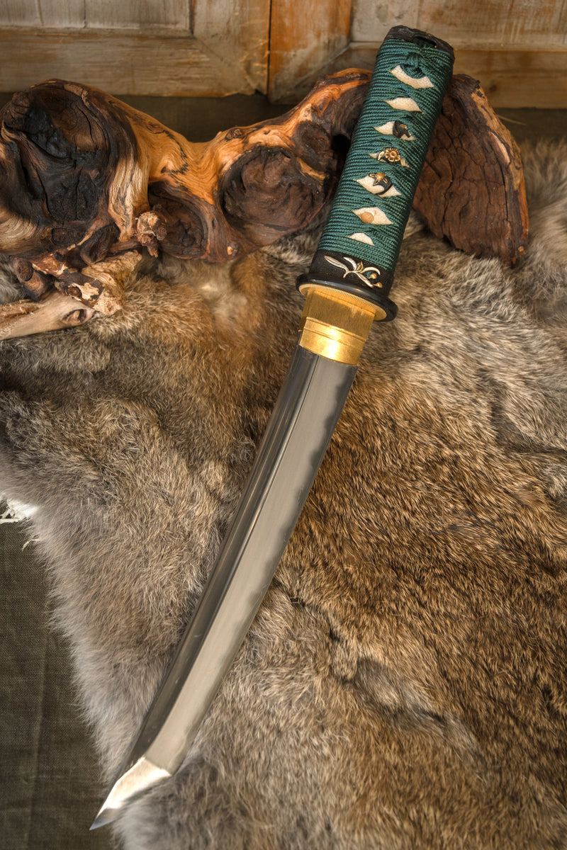 John Lee Tio Kejs Tanto, vass 