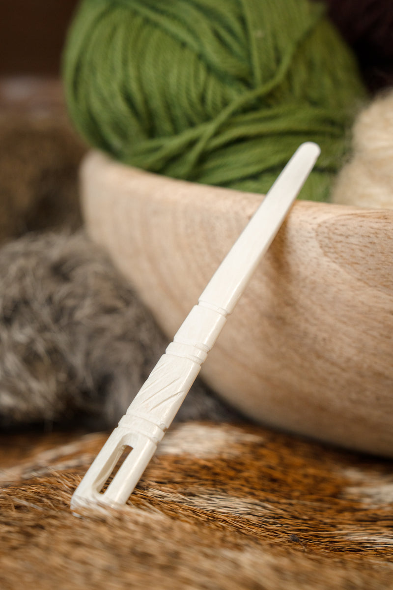 Gedecoreerde naaldbindnaald