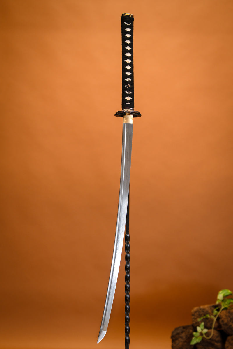 John Lee fleur d'or katana, tranchant 