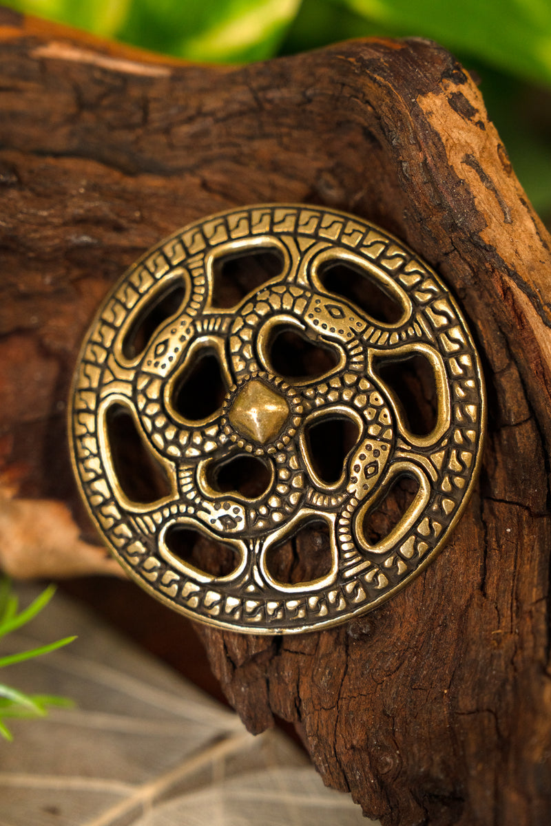 Germaanse zierscheibe, amulet, zamak