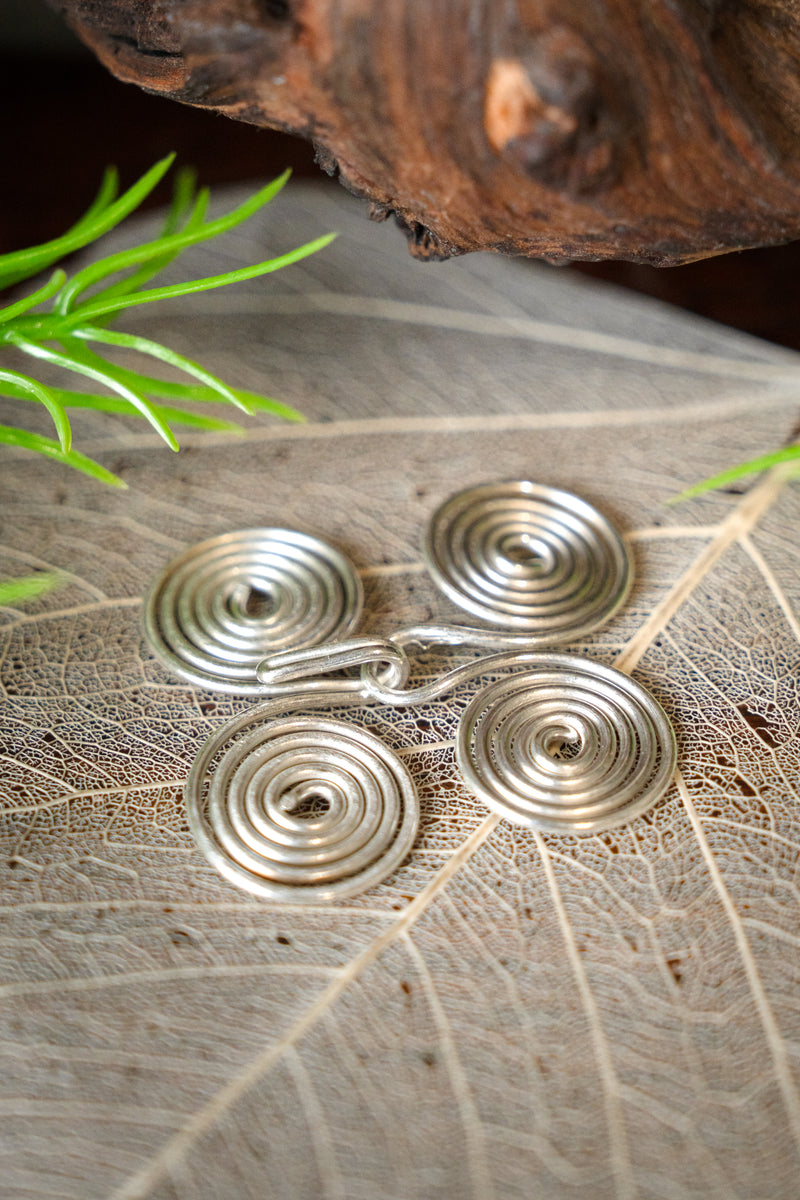 Anglo-Saxon cloak buckle, silvered bronze