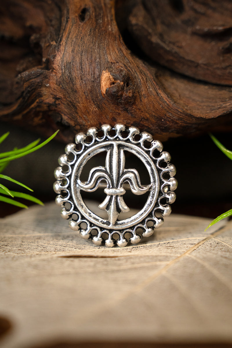 Medieval brooch fleur-de-Lys, silvered bronze