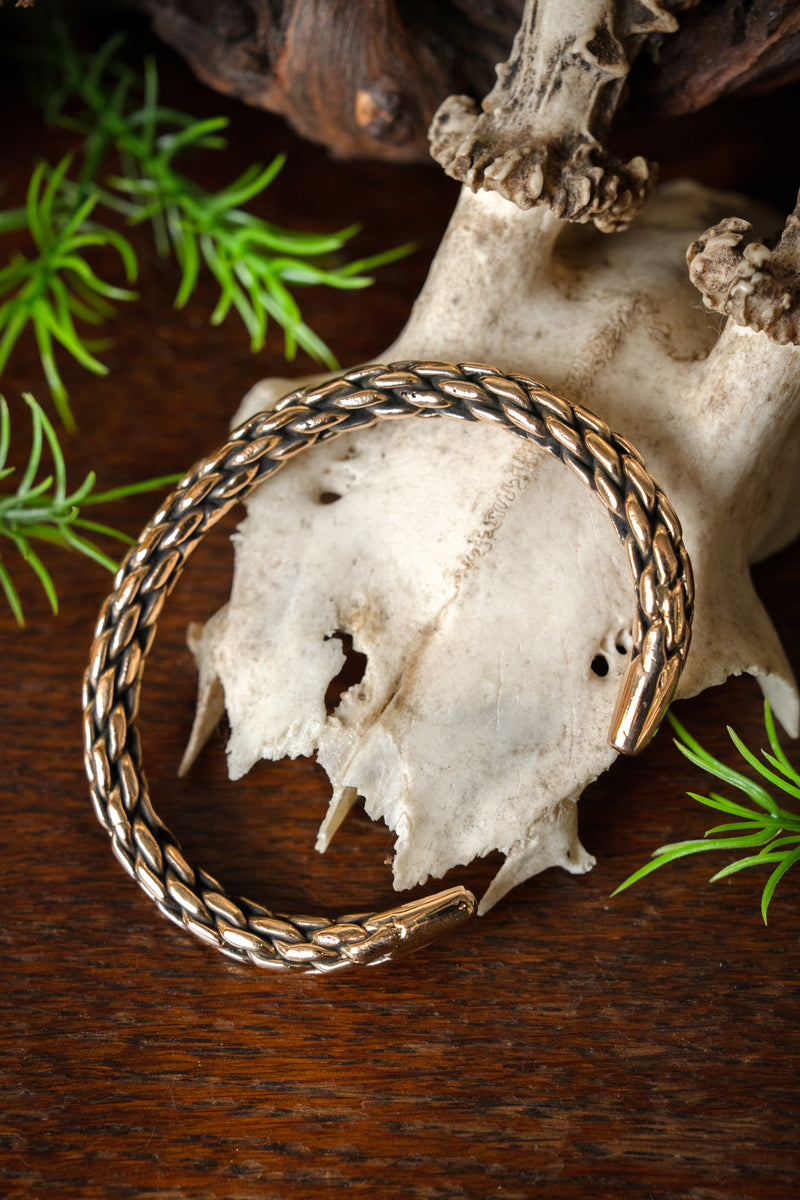 Gevlochten armband, brons