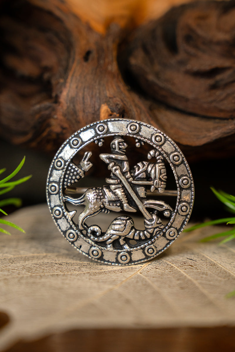 Middeleeuwse broche H .Joris, verzilverd brons