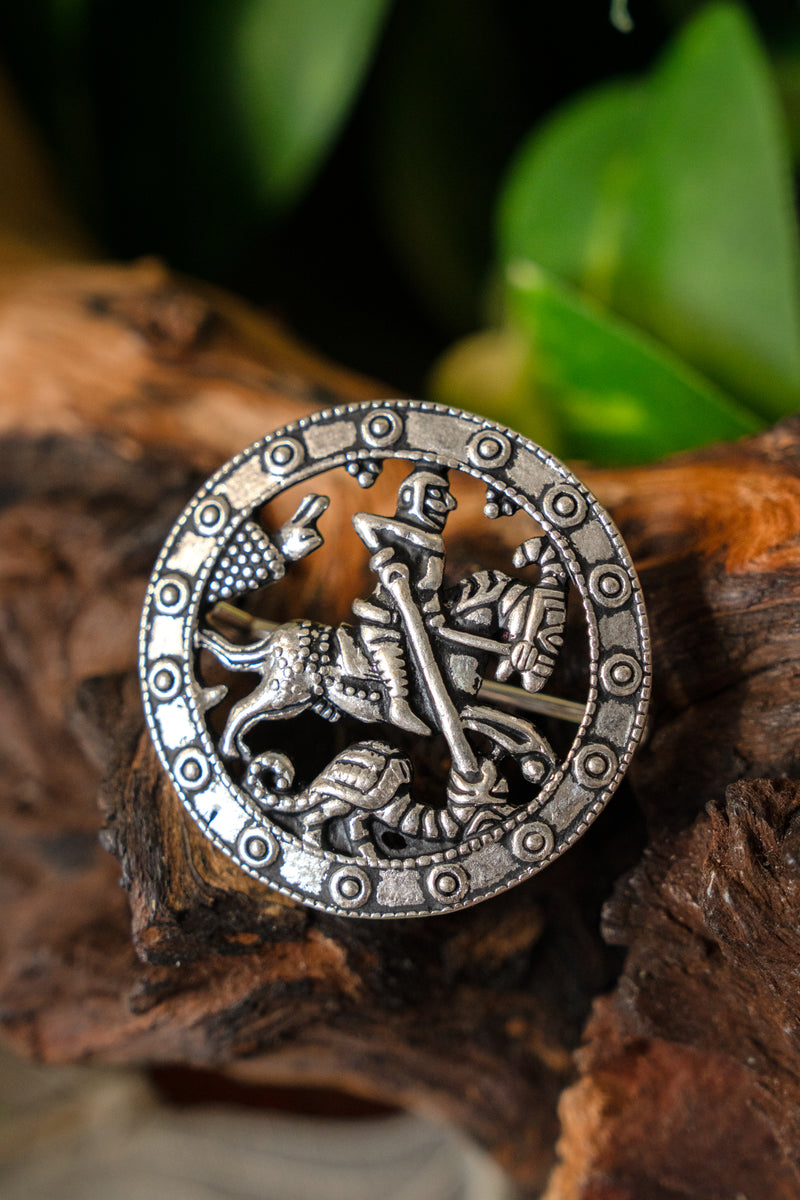 Middeleeuwse broche H .Joris, verzilverd brons