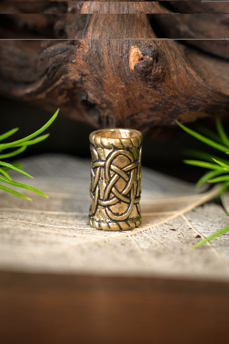 Cilindervormige baardkraal, brons