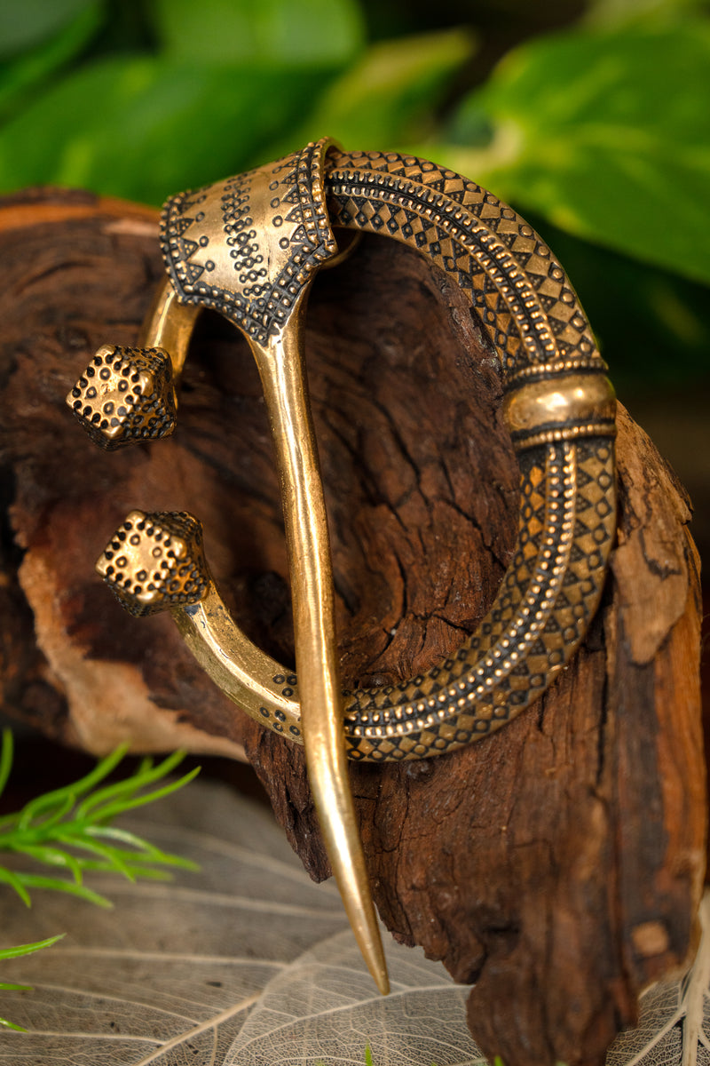 Fibule en fer à cheval Klintegarda, bronze 