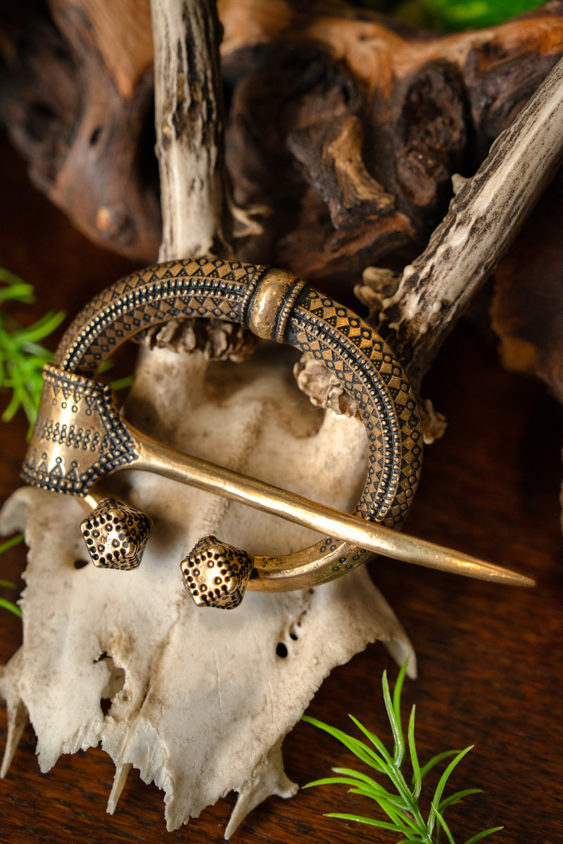 Fibule en fer à cheval Klintegarda, bronze 