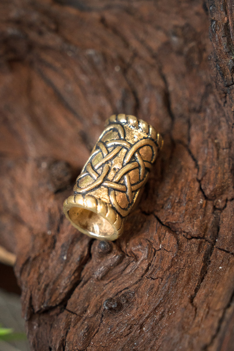 Cilindervormige baardkraal, brons