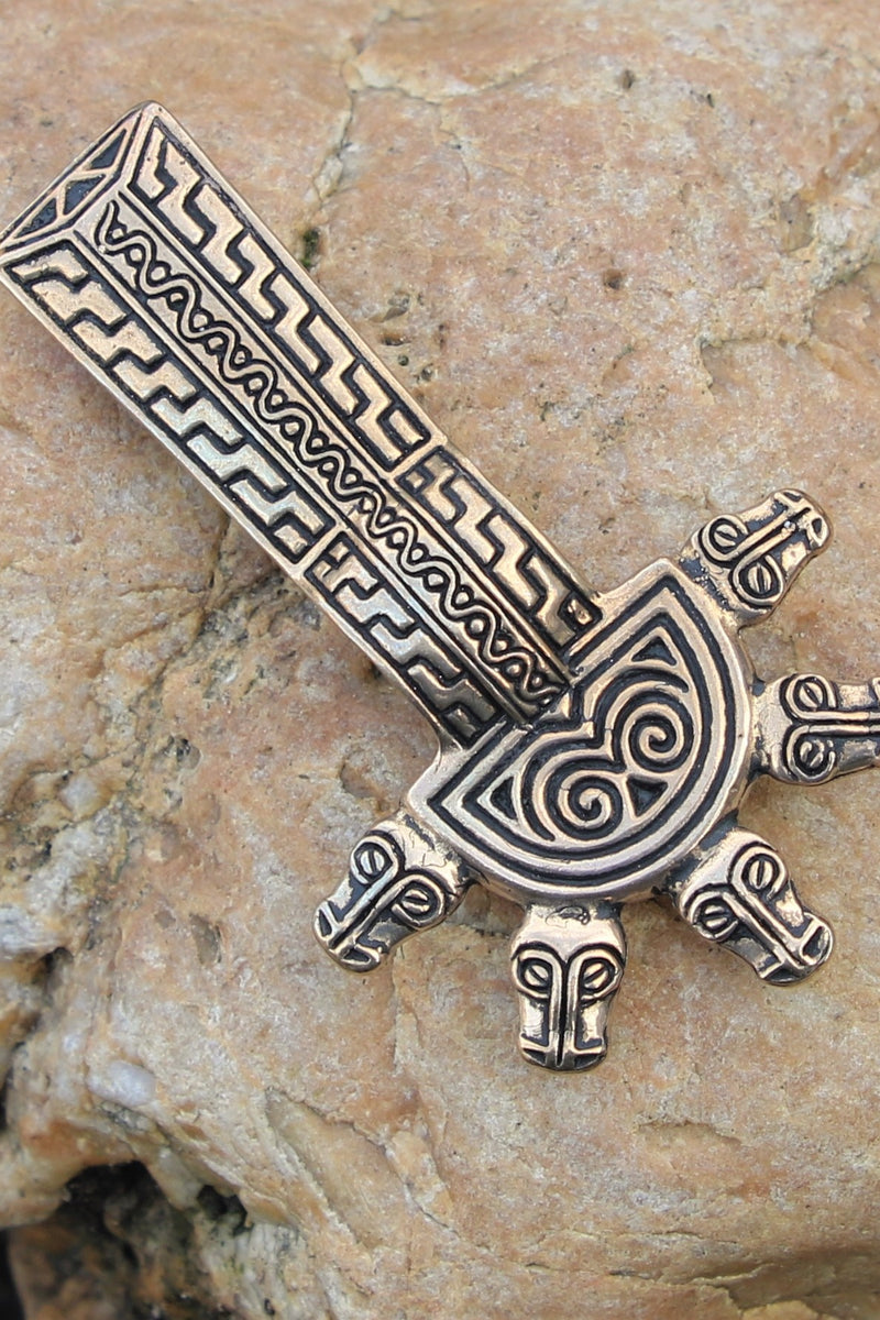 Merovingische beugelfibula, brons