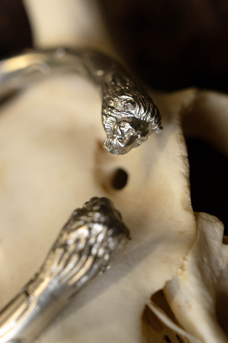 Romeinse armilae met leeuwenkoppen, paar, verzilverd messing