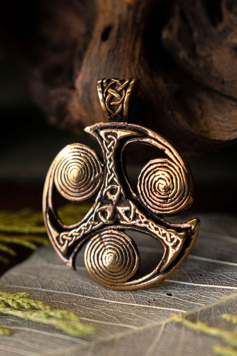 Celtic pendant triskelion with spirals, bronze