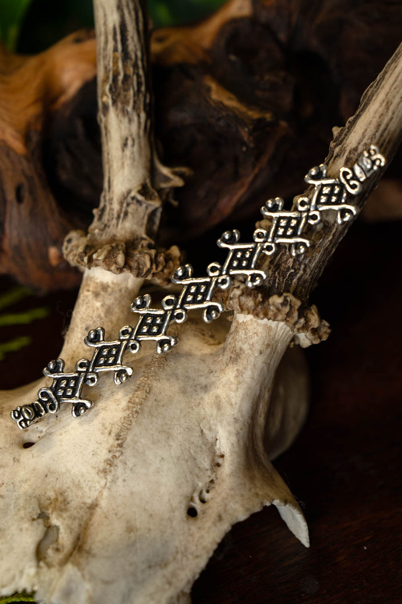 Birka sieraadverdeler, verzilverd brons