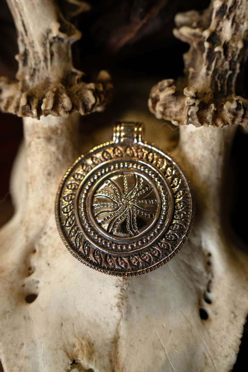 Amulet sun wheel, bronze