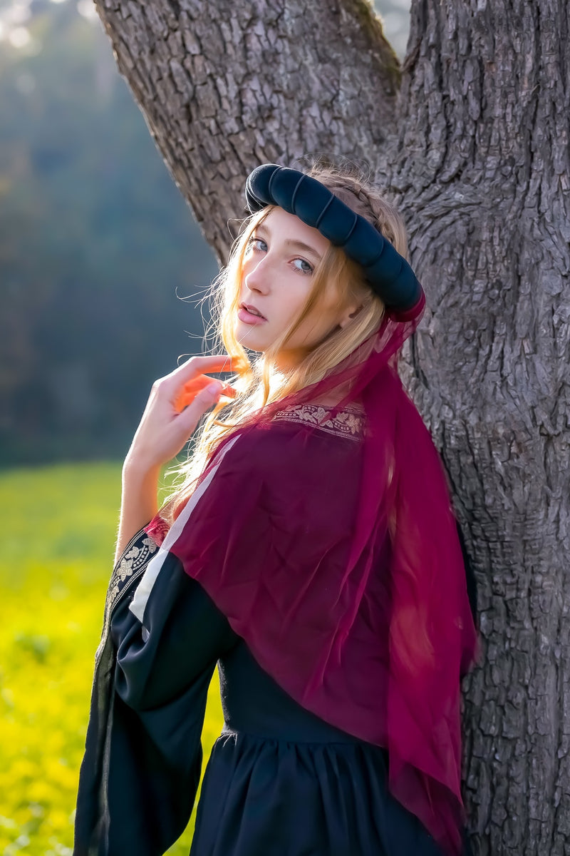 Jomfrukrans, sort–Rød 