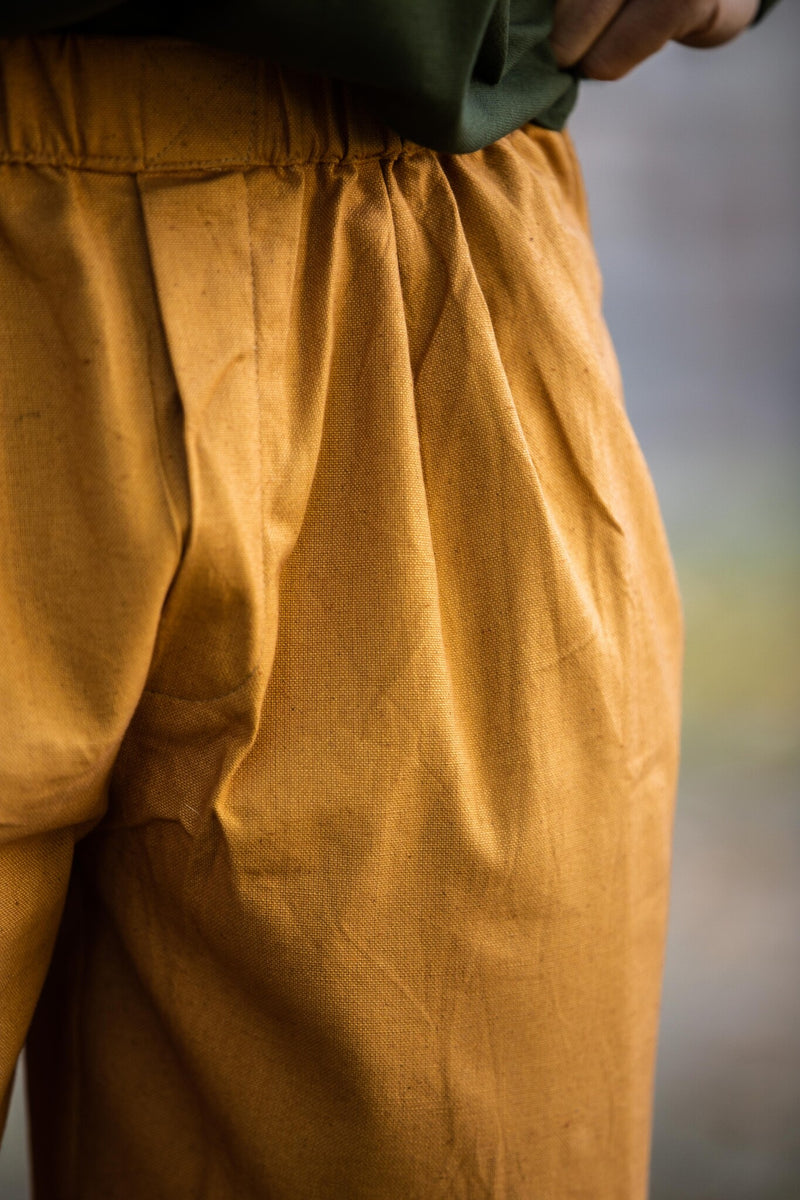 Trzy czwarte spodni, miód brązowy