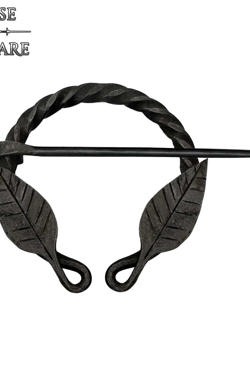Twisted horseshoe fibula with leaf motif, iron