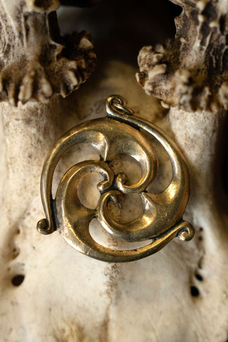 Gallo-Romeinse zonneamulet, brons