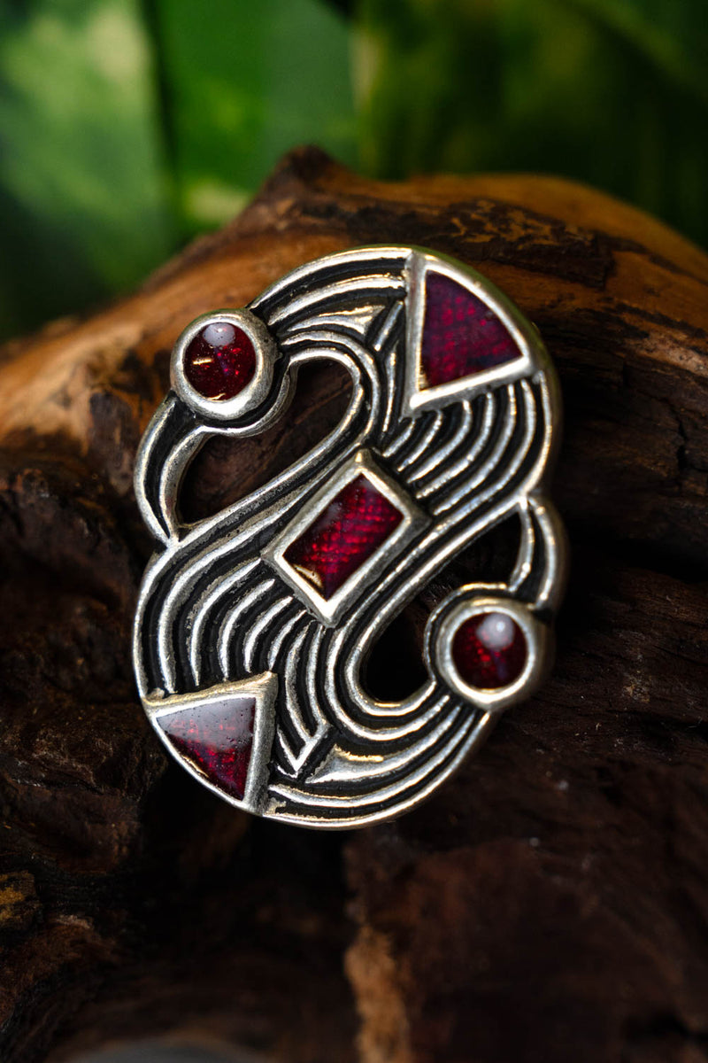 Laat-Merovingische S-fibula, verzilverd brons