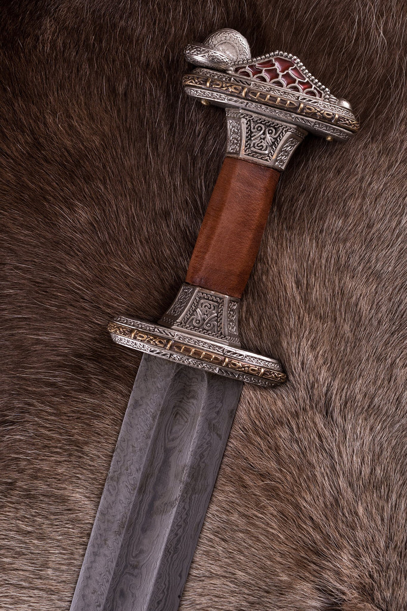 Espada Vendel Uppsala siglo VII-VIII, empuñadura estañada, damasco, semi-afilada 