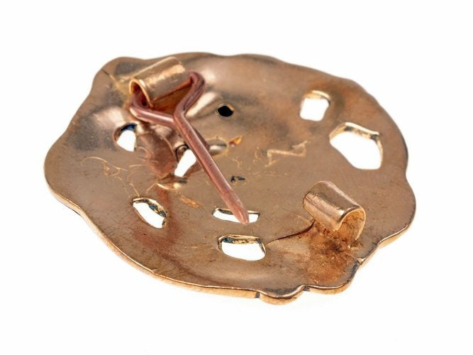 Urnesstijl schijffibula, brons