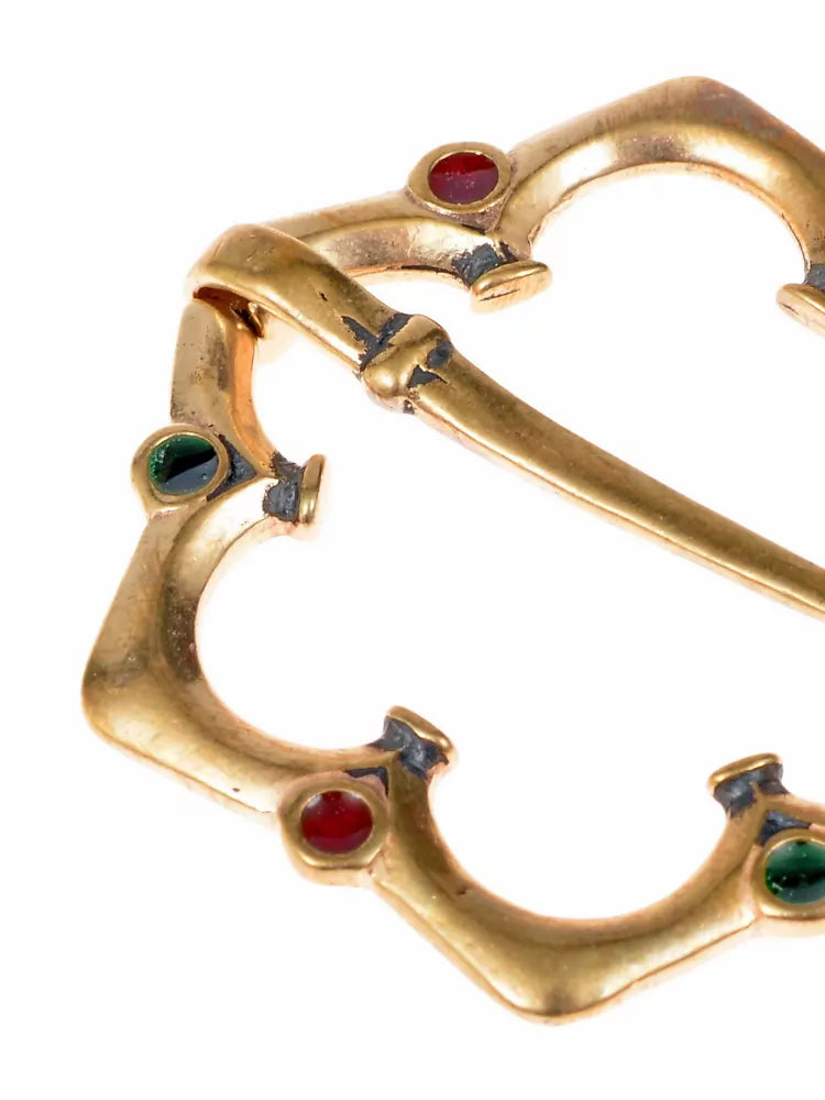 Espada medieval fibula con incrustaciones de vidrio, bronce 