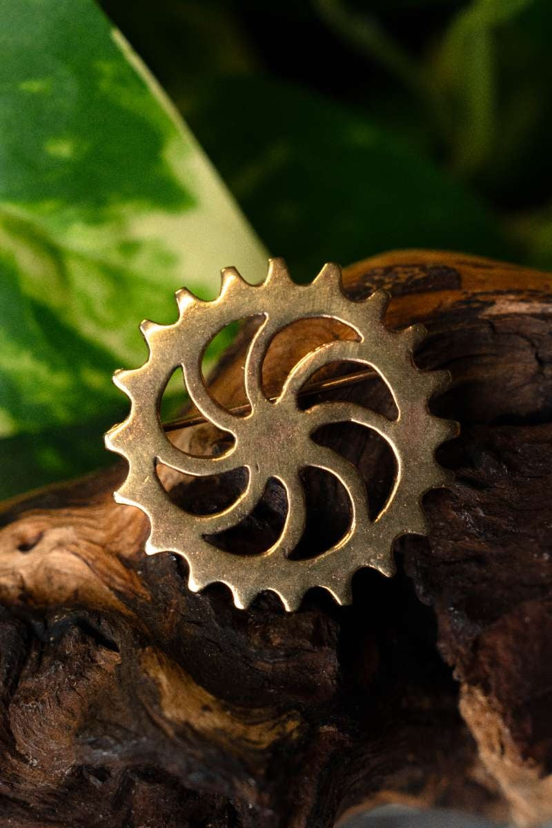 Römische Scheibenfibel Sonnenrad, Bronze 