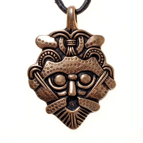 Gnezdovo masker amulet, brons