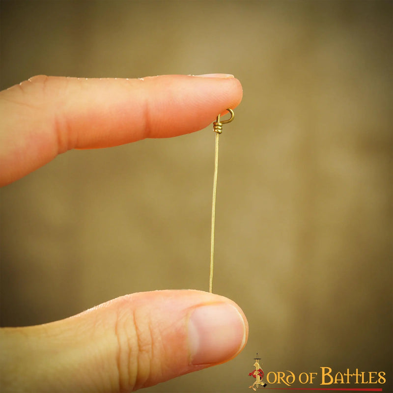 Spelden, zes stuks, messing